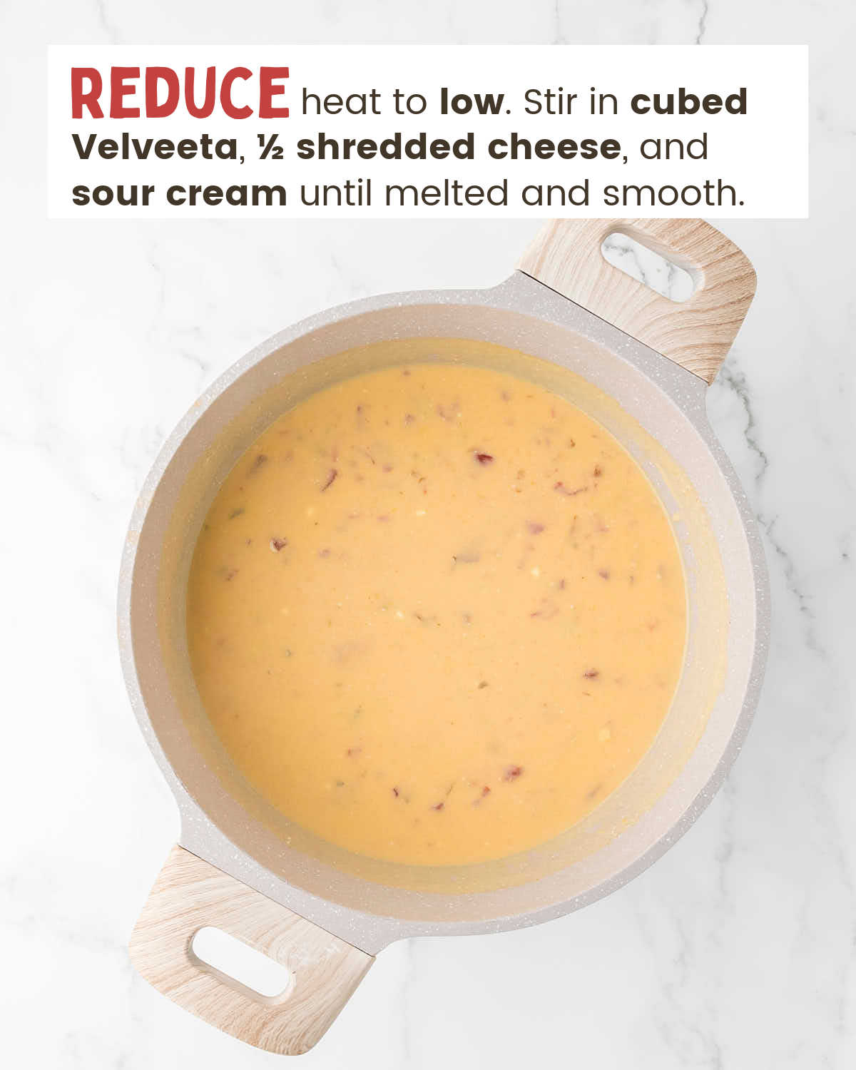 Cheesy Rotel cheese sauce in a pot.