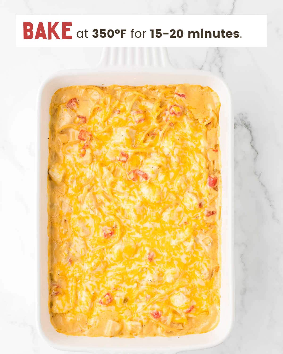 Chicken spaghetti with Rotel in a baking dish.