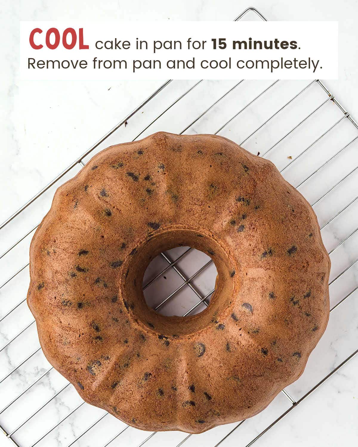 Chocolate chip Bundt cake on a cooling rack.