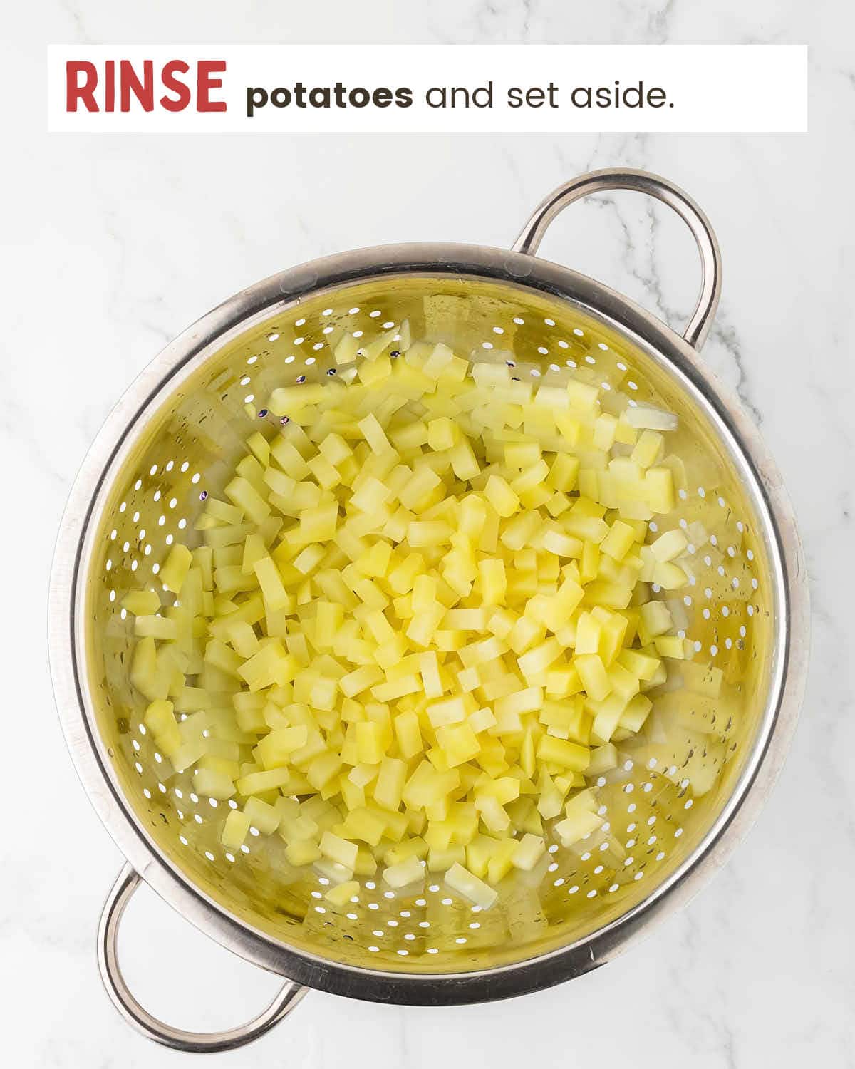 Dices potatoes in a strainer.