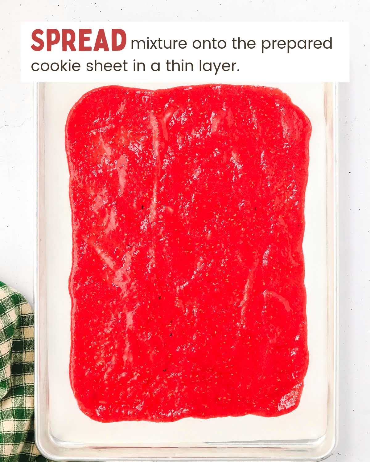Fruit mixture on a cookie sheet.