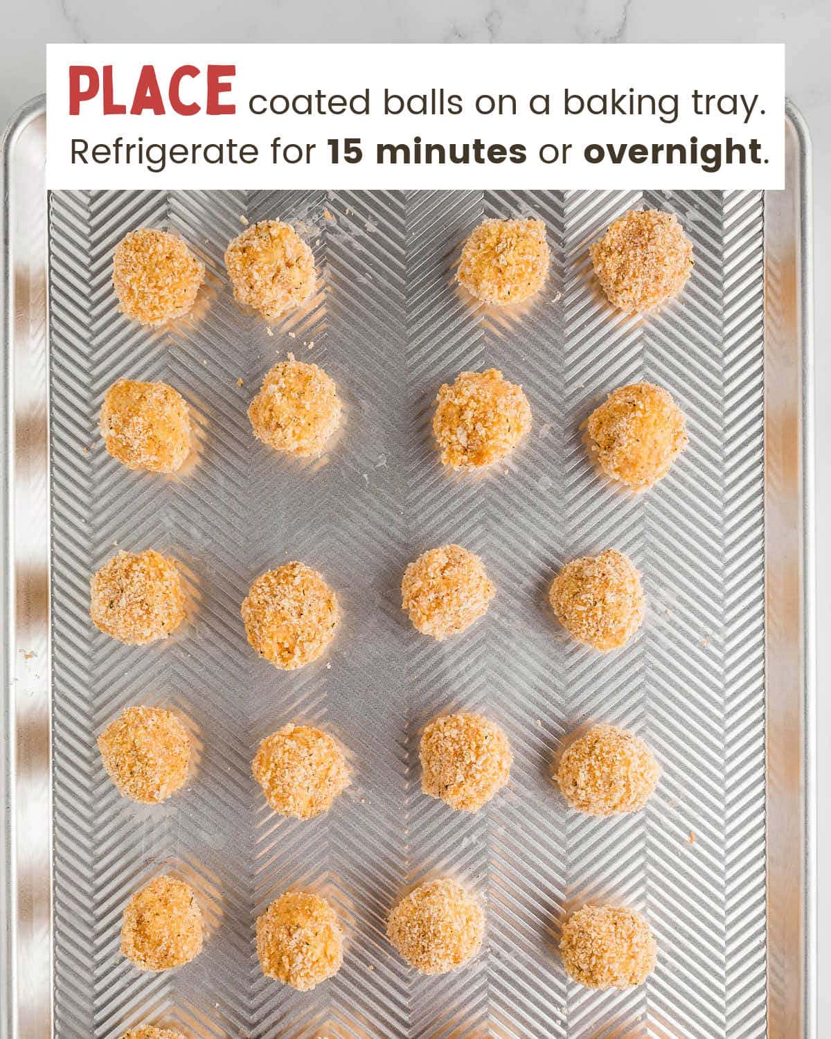 Mac and cheese bites on a baking tray.