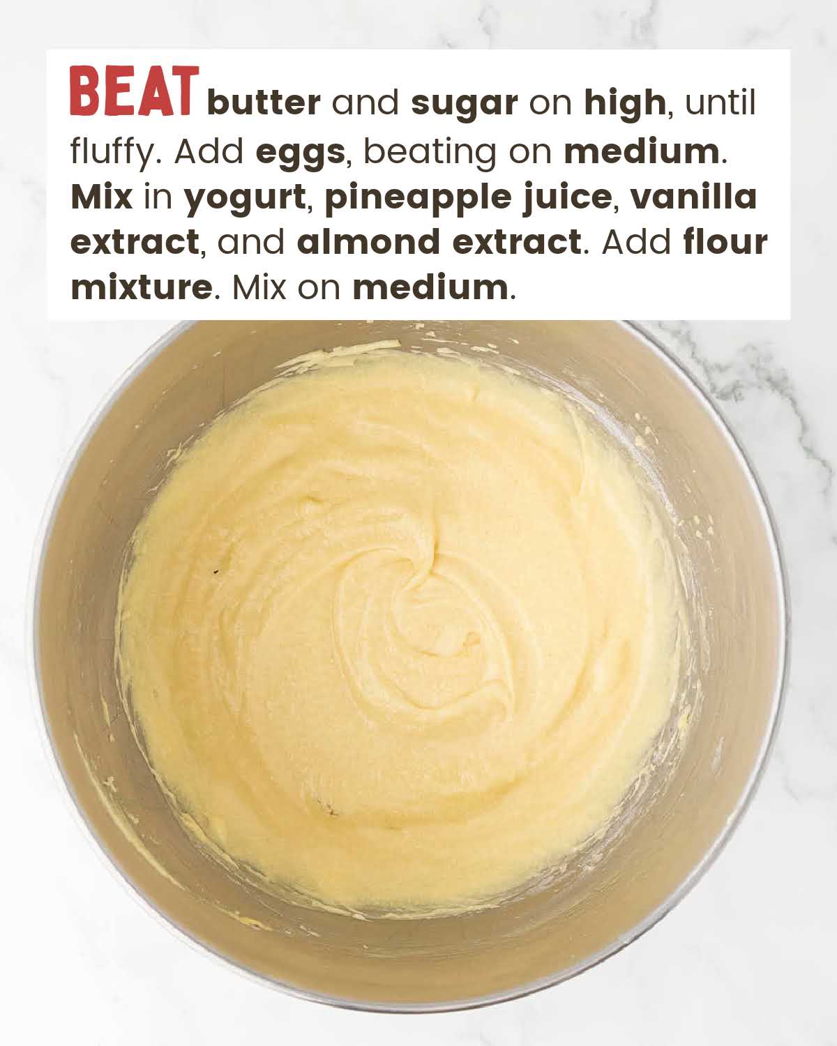 Cake batter in a mixing bowl.