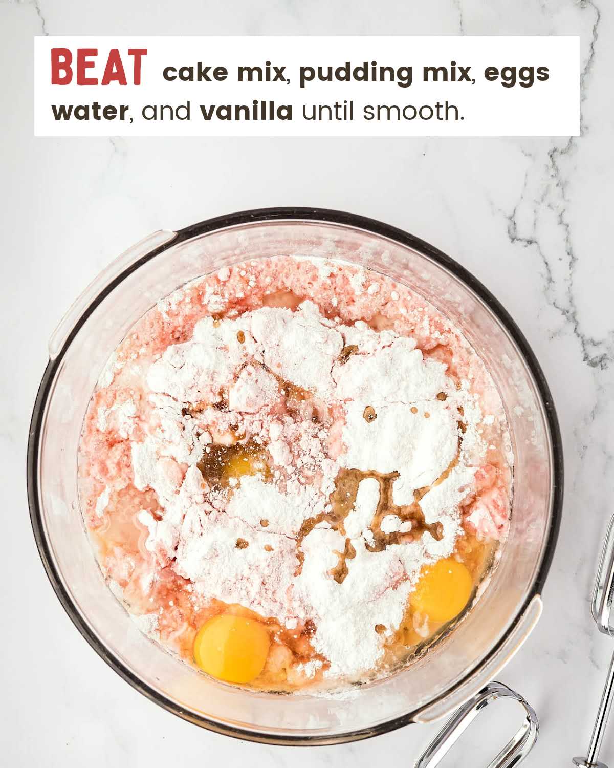 Ingredients for Strawberry cake in mixing bowl.