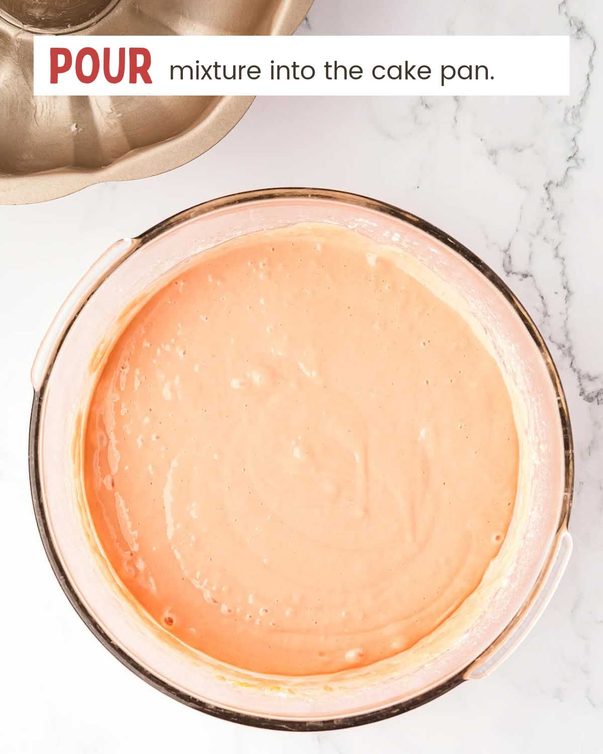 Strawberry cake batter in a mixing bowl.