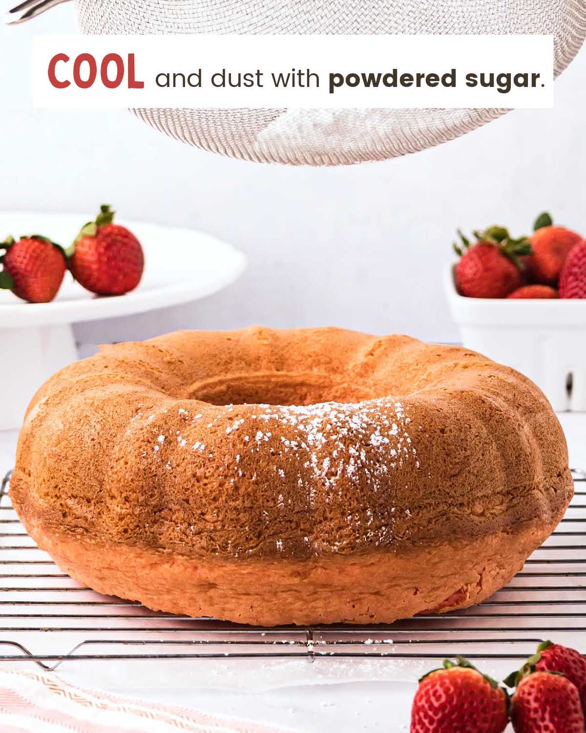 Strawberry Bundt cake on a cooling rack.
