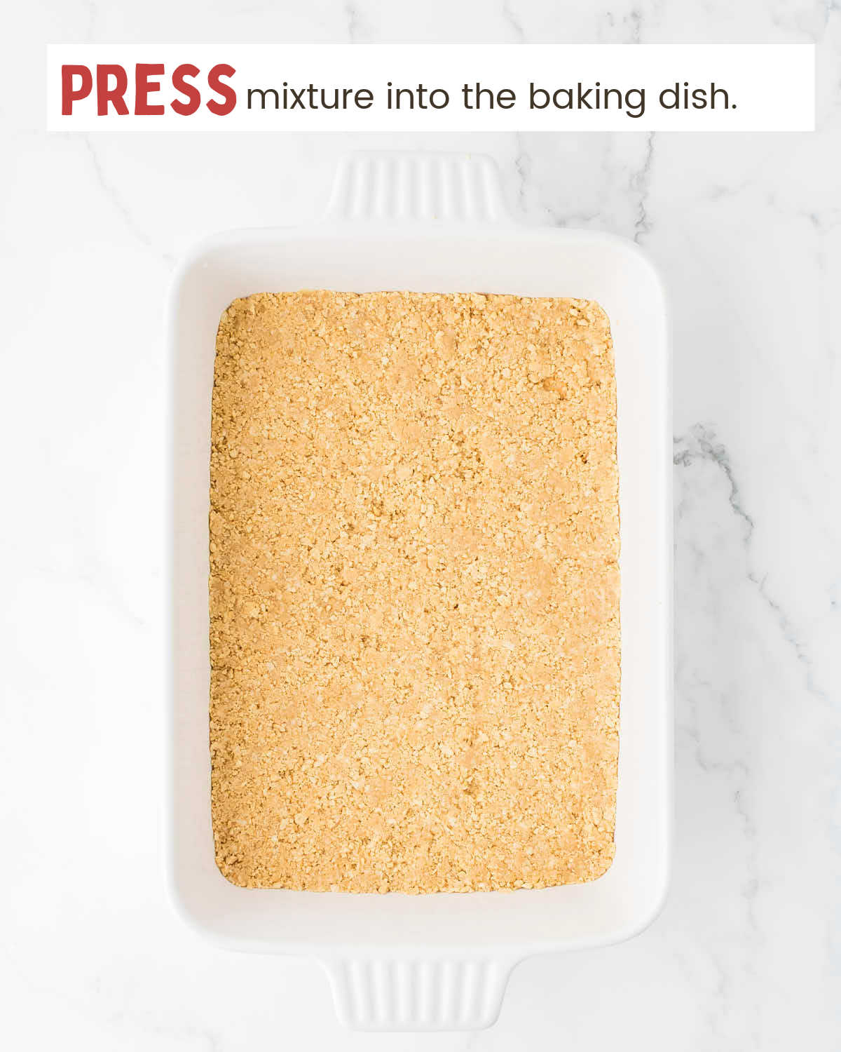 Golden Oreo cookie crumbs mixed with melted butter pressed into a baking dish as a crust.
