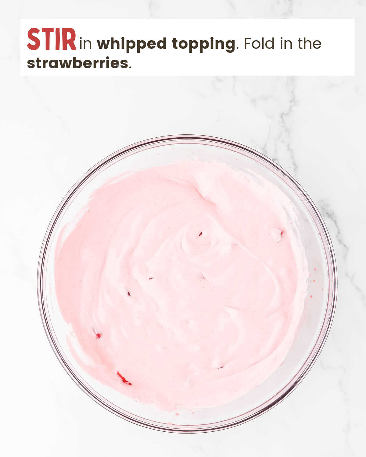Strawberry mixture with whipped topping mixed in.