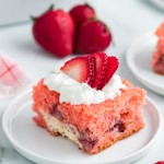 Strawberry Earthquake Cake on a white plate.