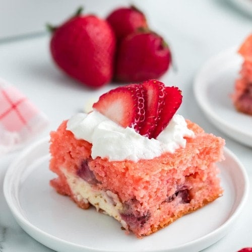 Strawberry Earthquake Cake on a white plate.