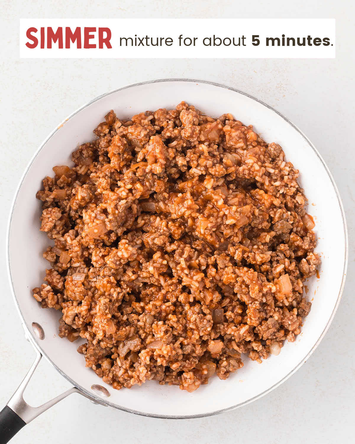 Cooked meat mixture in a frying pan.