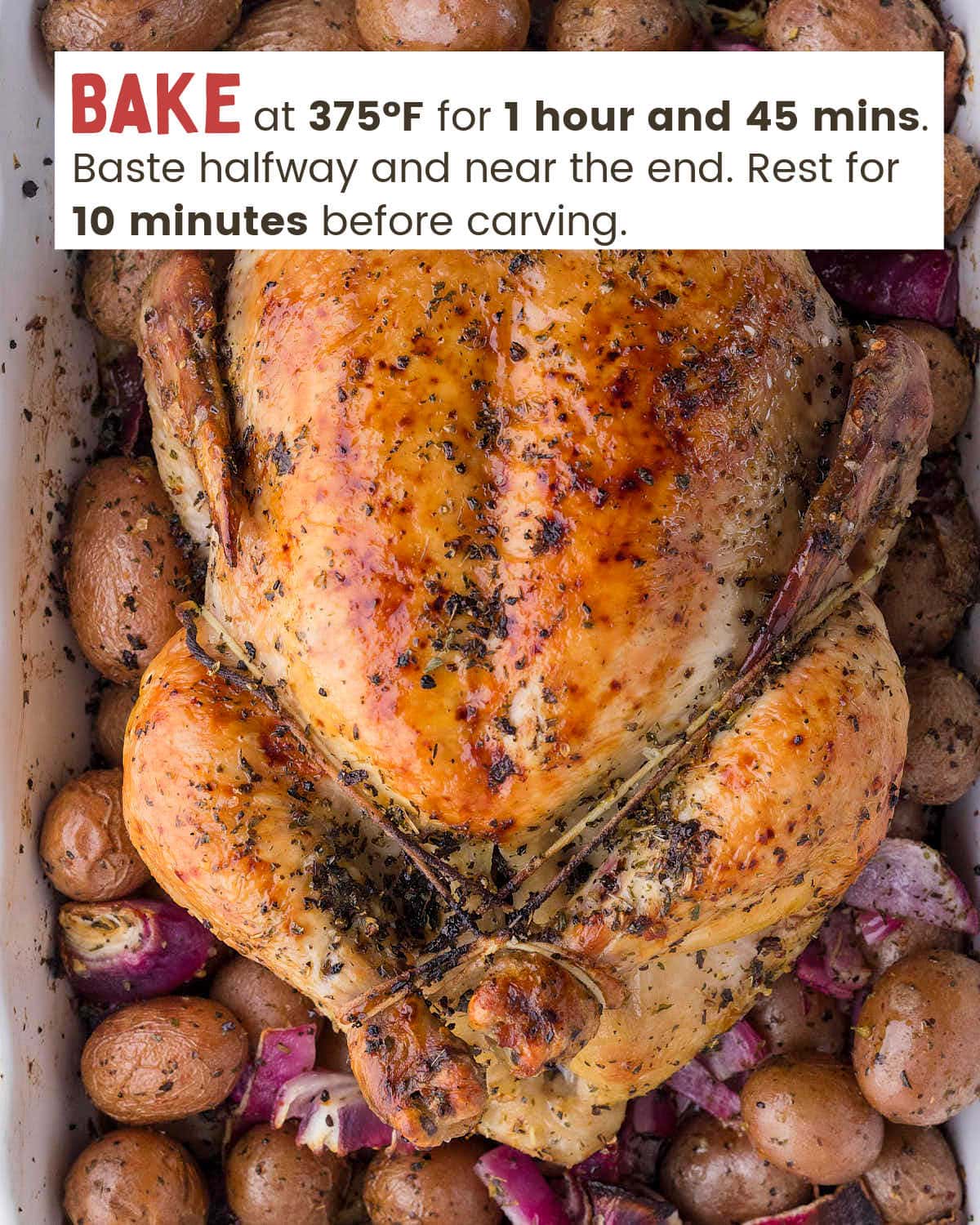 Greek roasted chicken with potatoes and onions in baking dish.