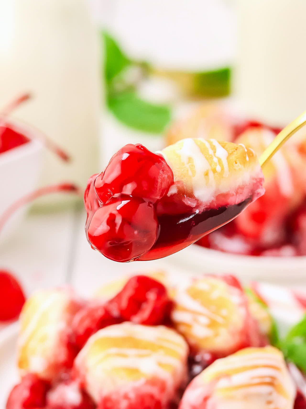 A spoonful of freshly baked Cherry Cobbler. 