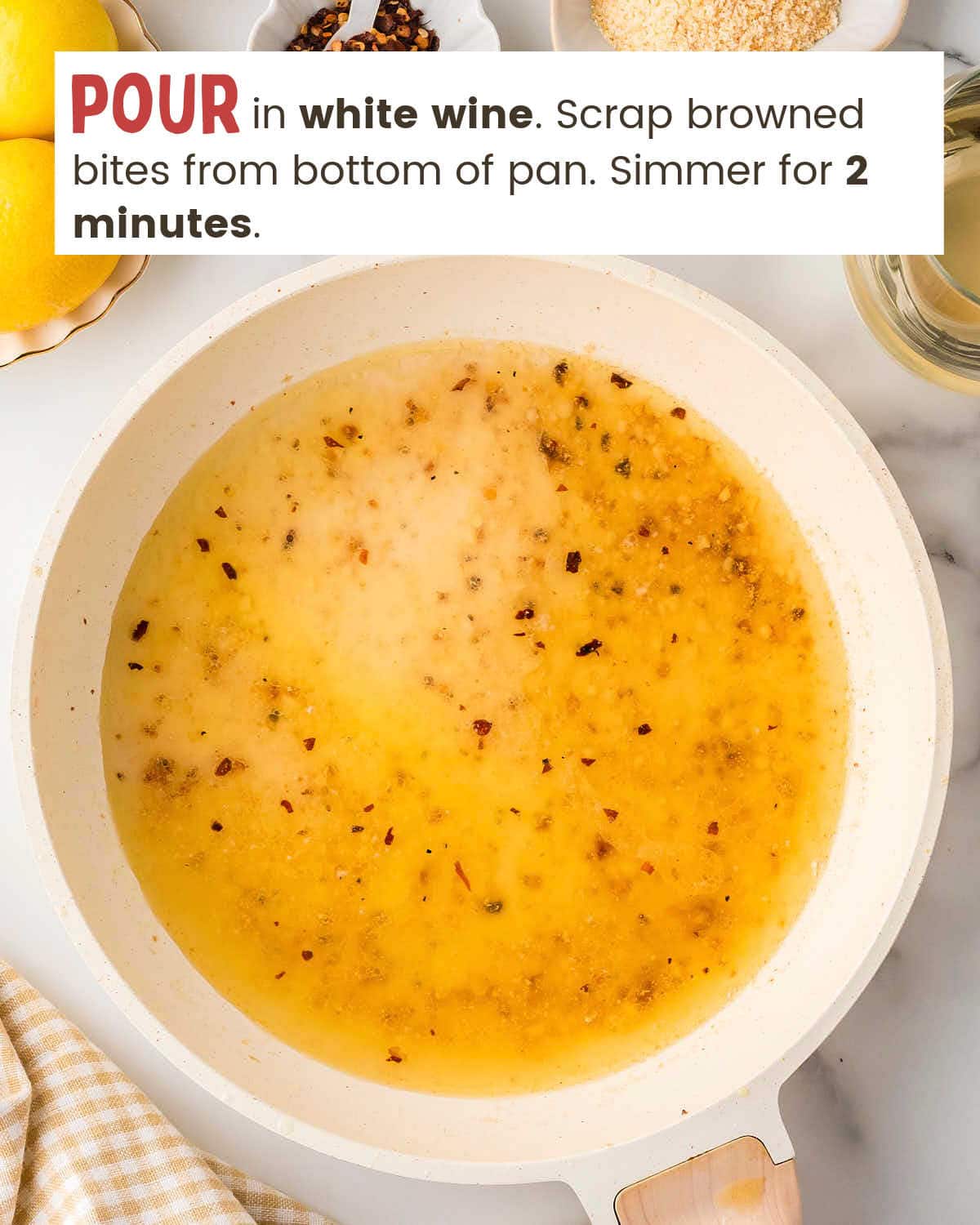 Butter and garlic and white wine in a skillet.