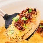 A spoonful of a slice of Crockpot Marry Me Chicken.