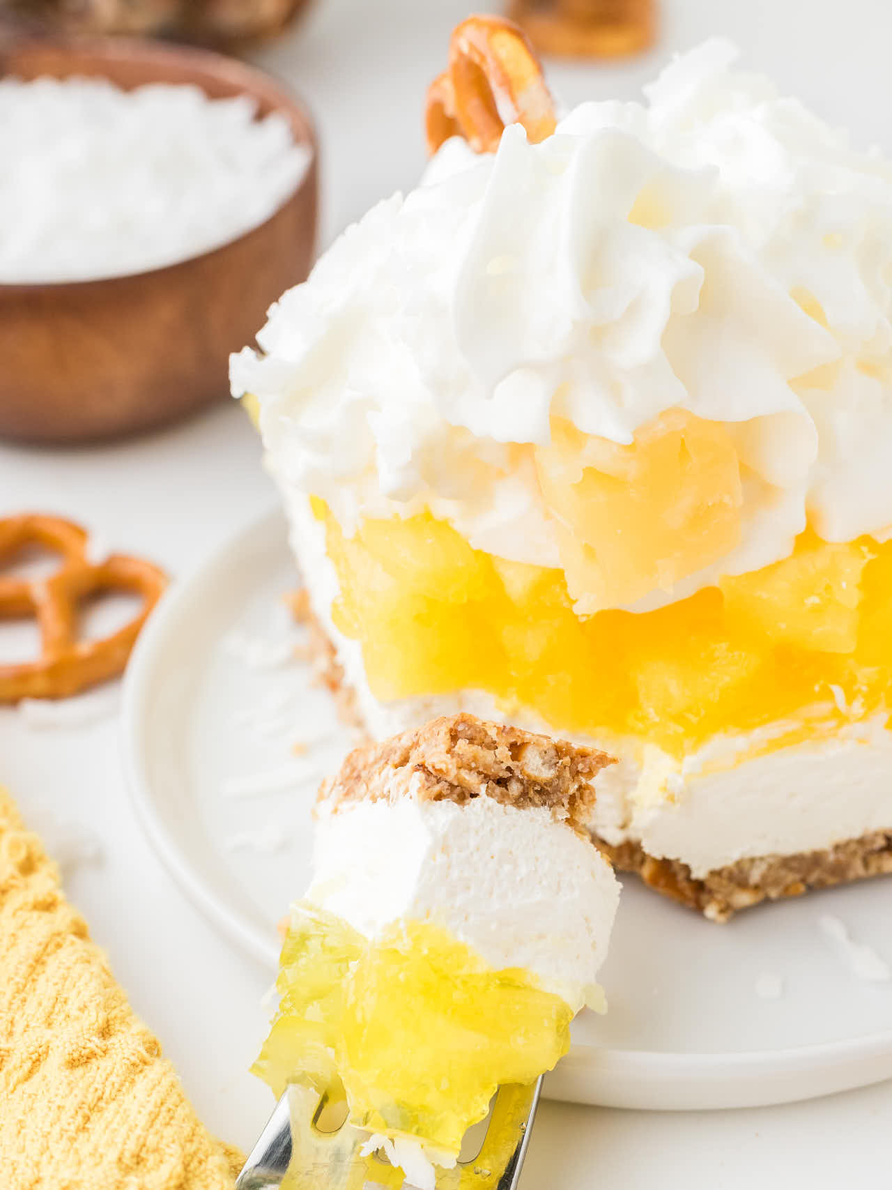 A forkful of Pineapple Pretzel Salad.