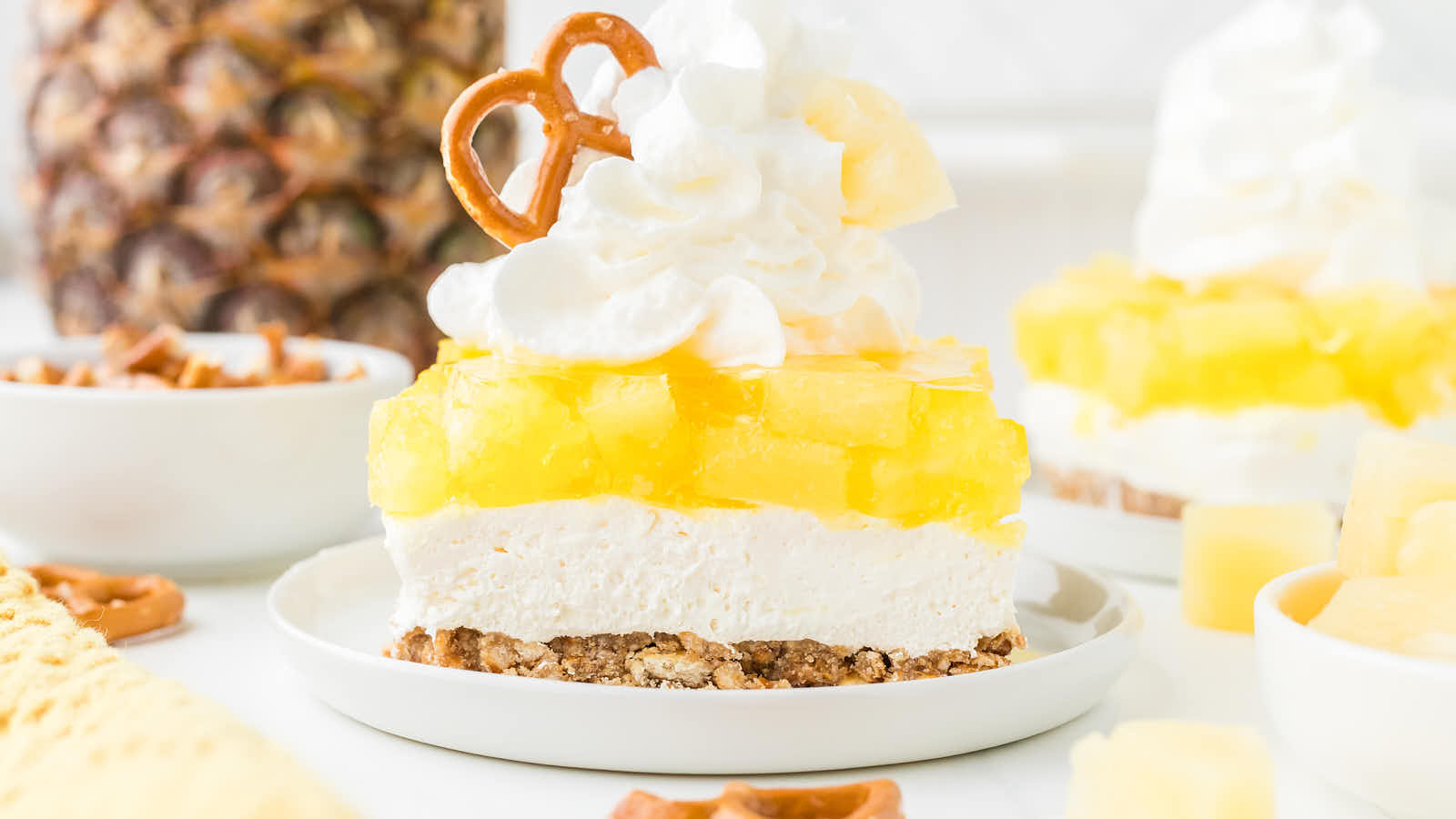 Pineapple Pretzel Salad recipe by Cheerful Cook.