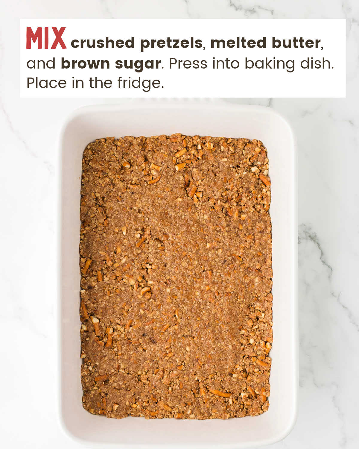 Pretzel crust in a baking dish. 