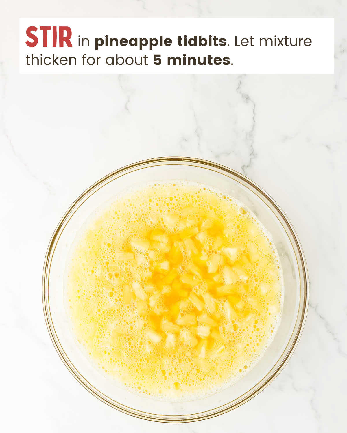 Pineapple tidbits mixed in a jello mixture.