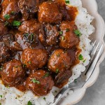 Closeup of Salisbury Steak Meatballs served over mashed potatoes.