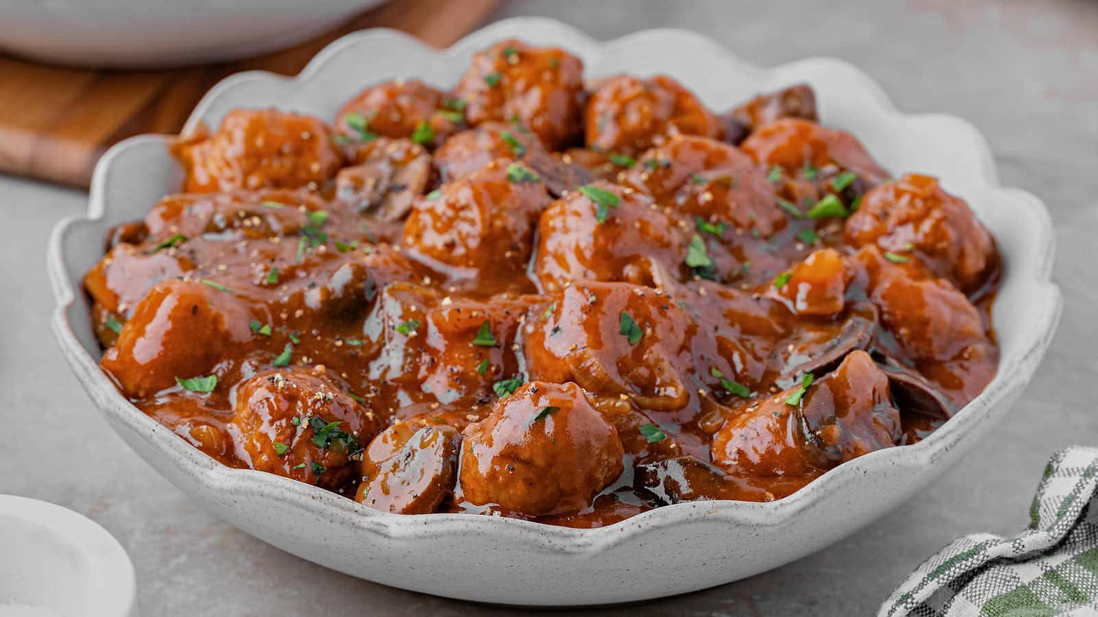 Salisbury Steak Meatballs made in the Crockpot recipe by Cheerful Cook.