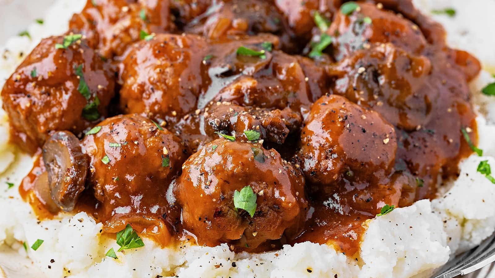 Salisbury Steak Meatballs made in the Crockpot recipe by Cheerful Cook.