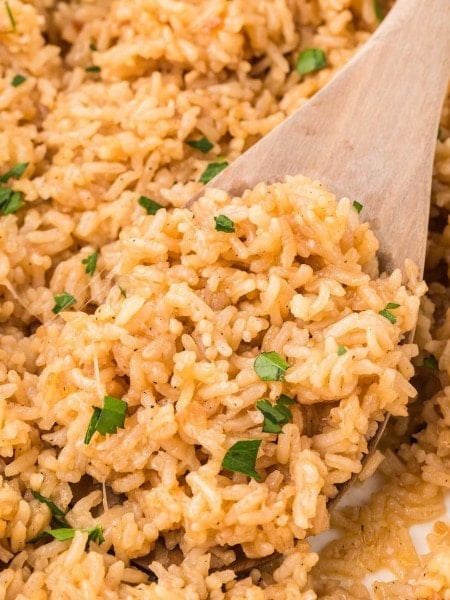 A wooden spoonful of Stick of Butter Rice.
