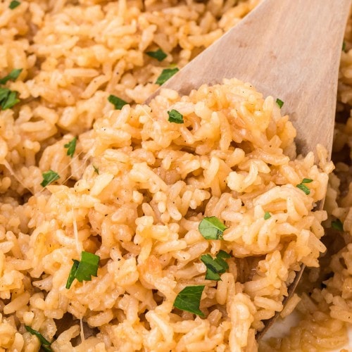 A wooden spoonful of Stick of Butter Rice.