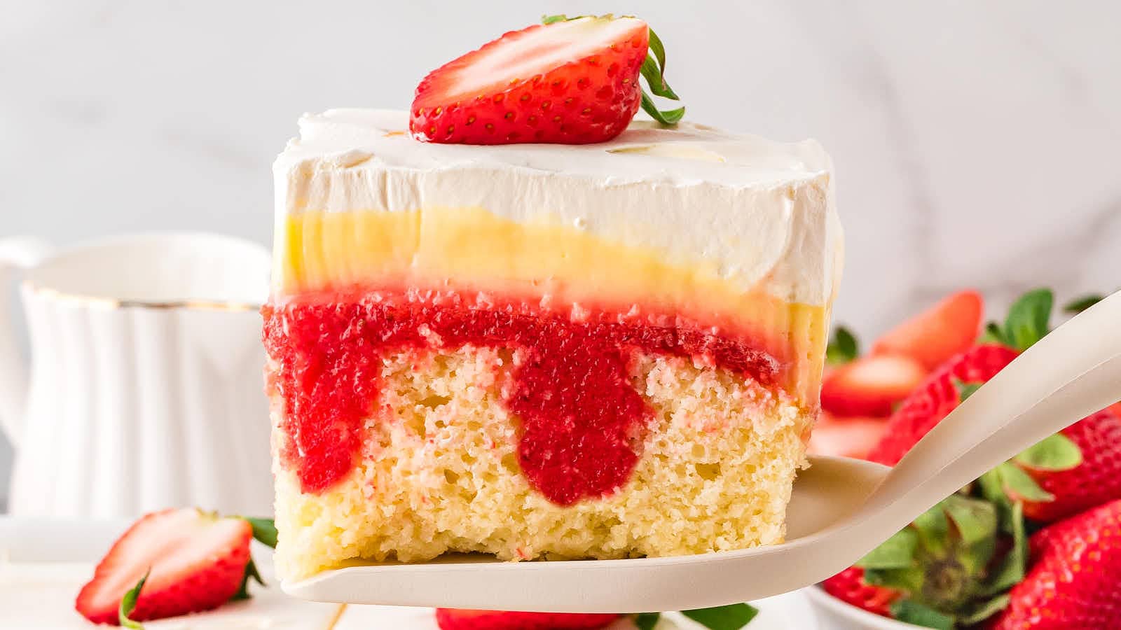 Strawberry Poke Cake recipe by Cheerful Cook.