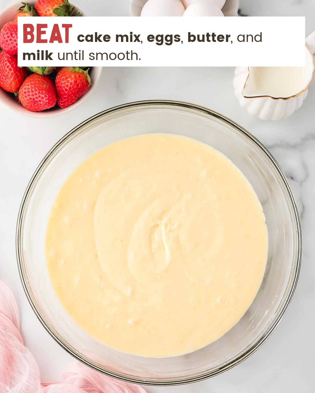 Cake batter in a mixing bowl. 
