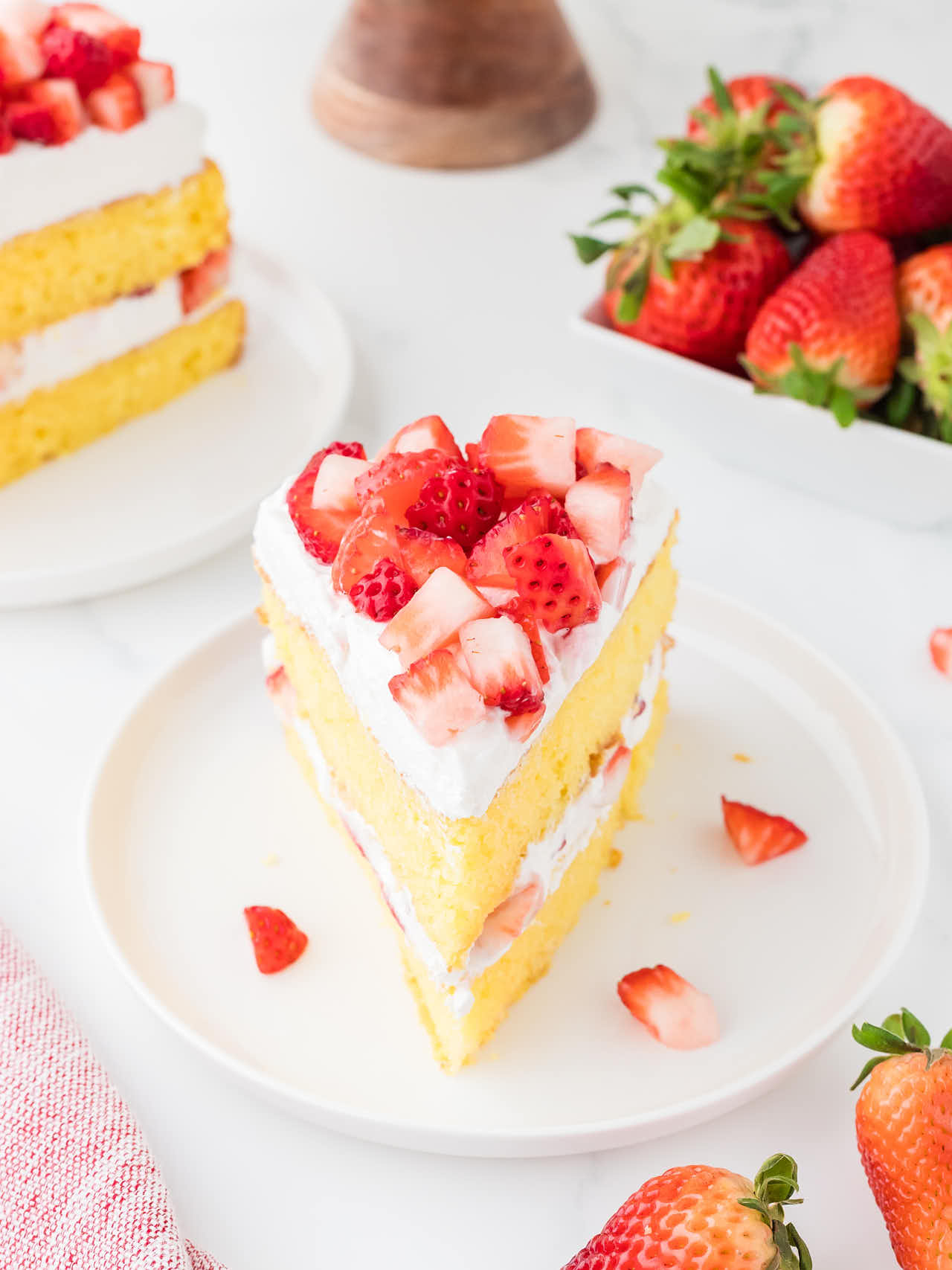 Strawberry Shortcake served on a white plate.