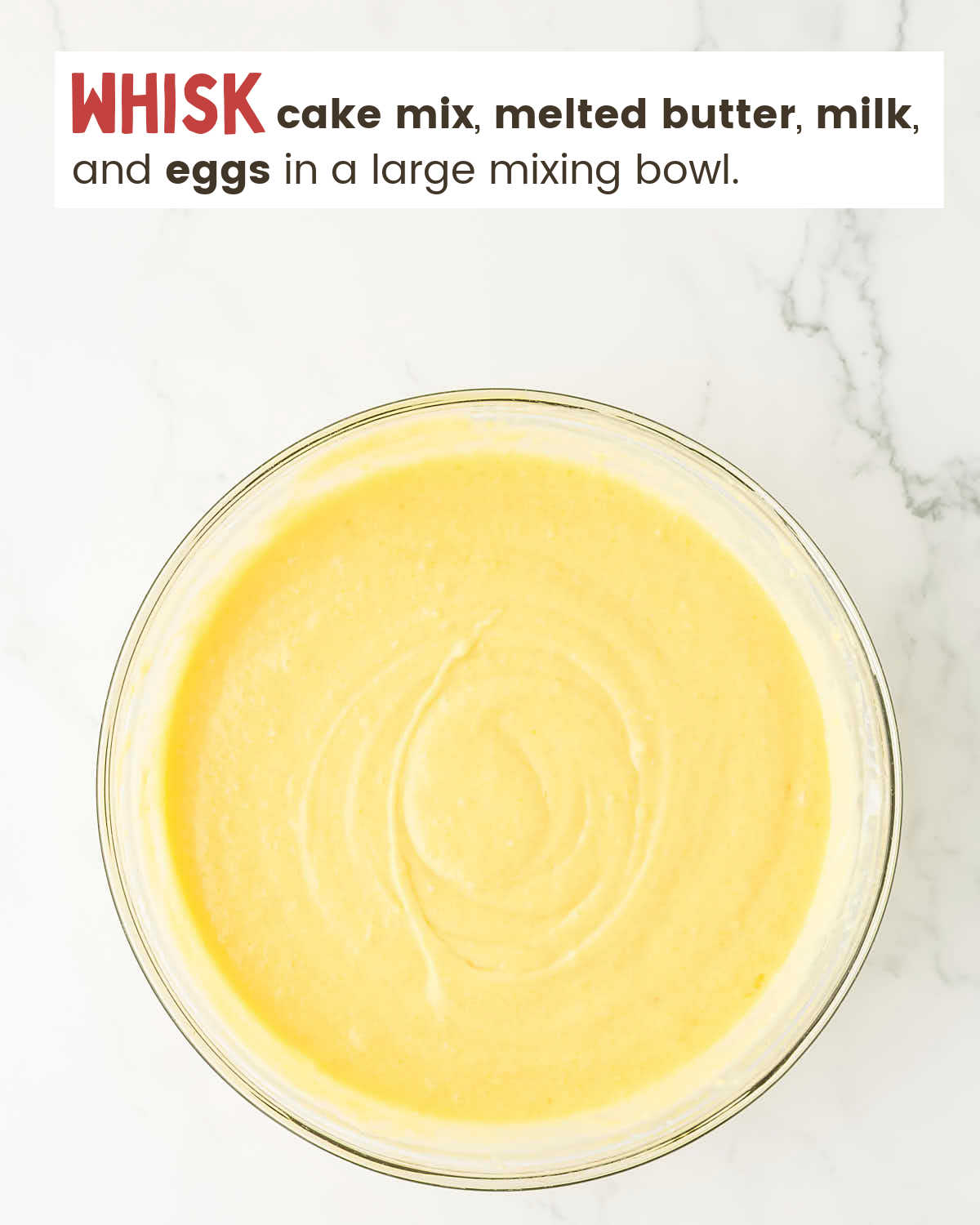 Cake batter in a mixing bowl.