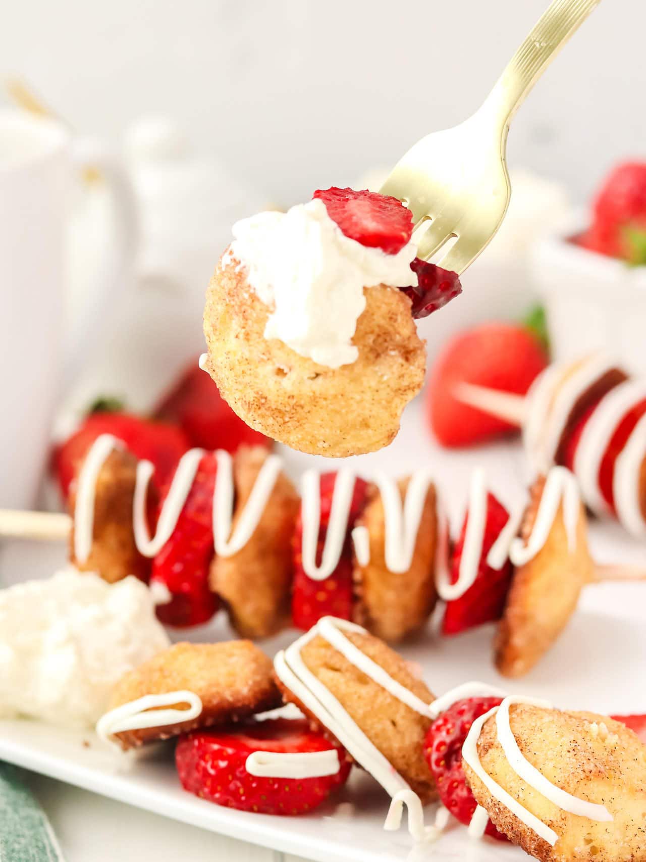 A forkful of Strawberry Shortcake Skewers.