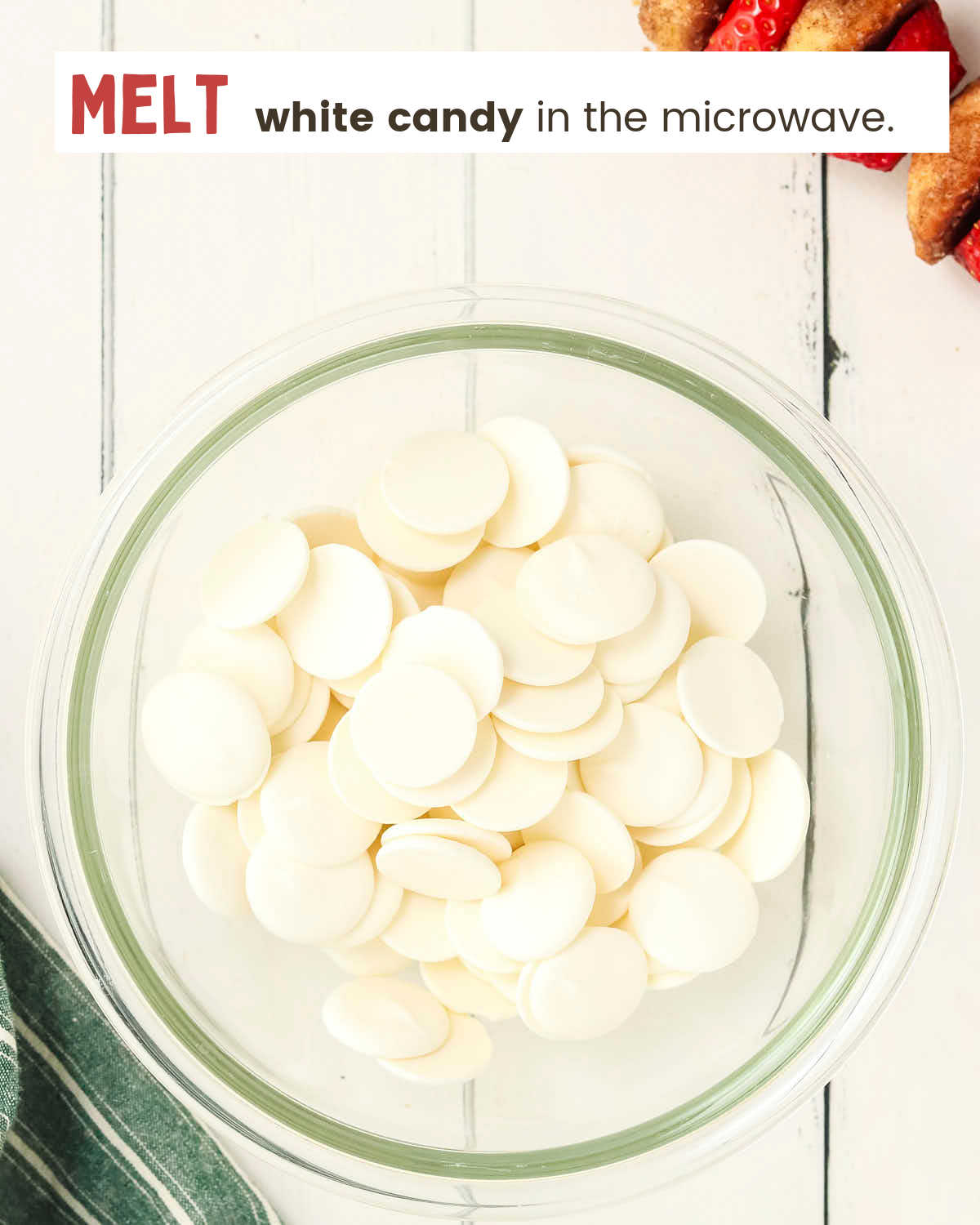 White chocolate candies in a glass bowl.