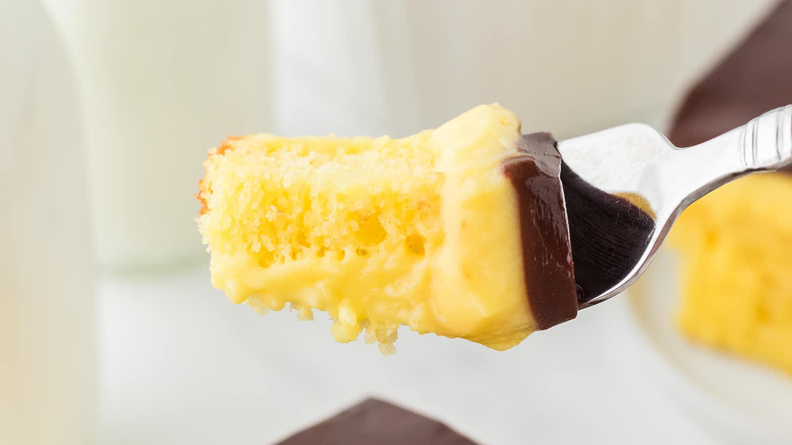 Boston Cream Poke Cake by Cheerful Cook.
