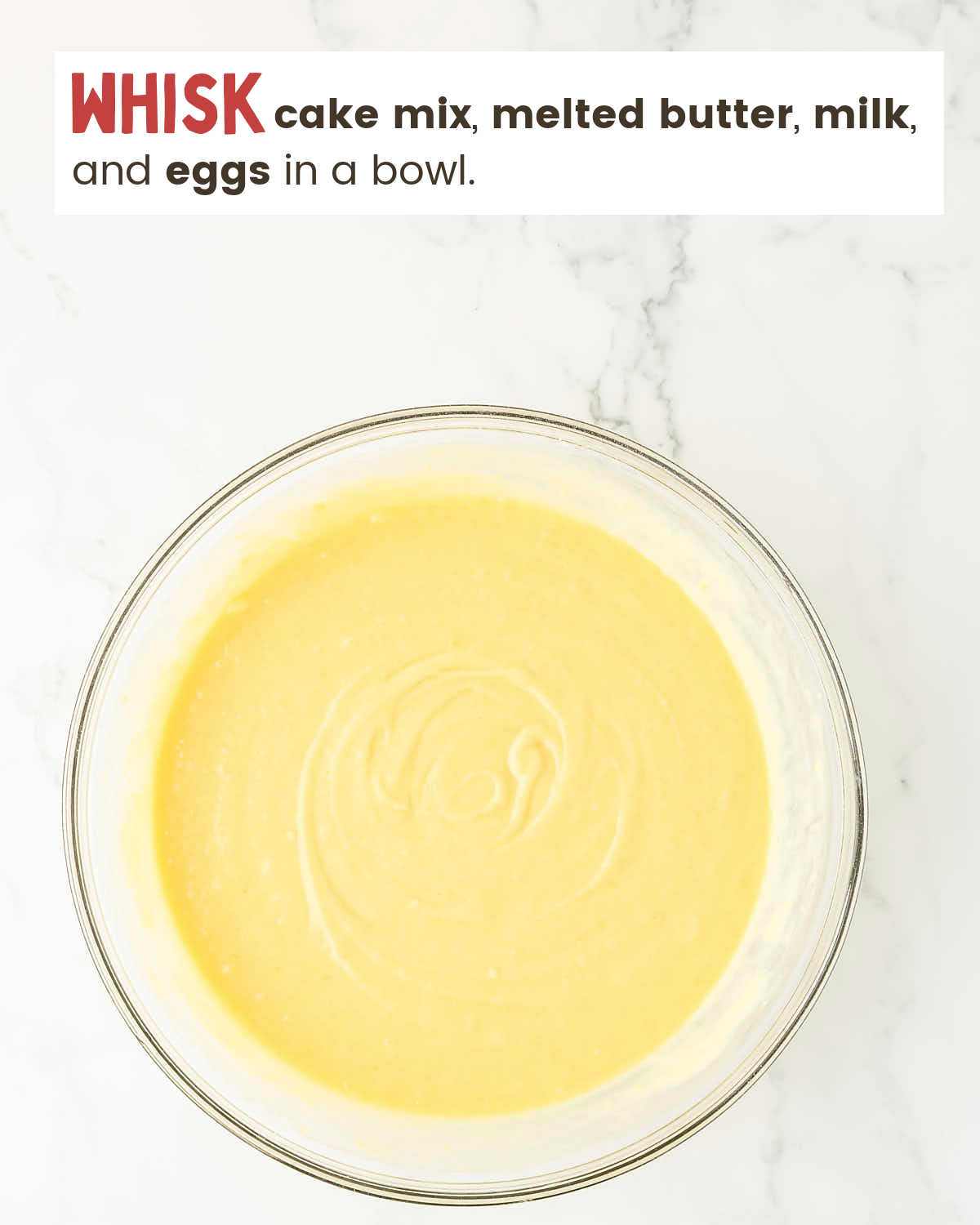 Cake batter in a mixing bowl. 