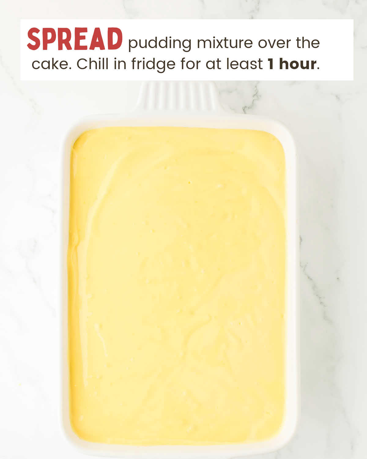 Pudding mixture covering cake in a baking dish.