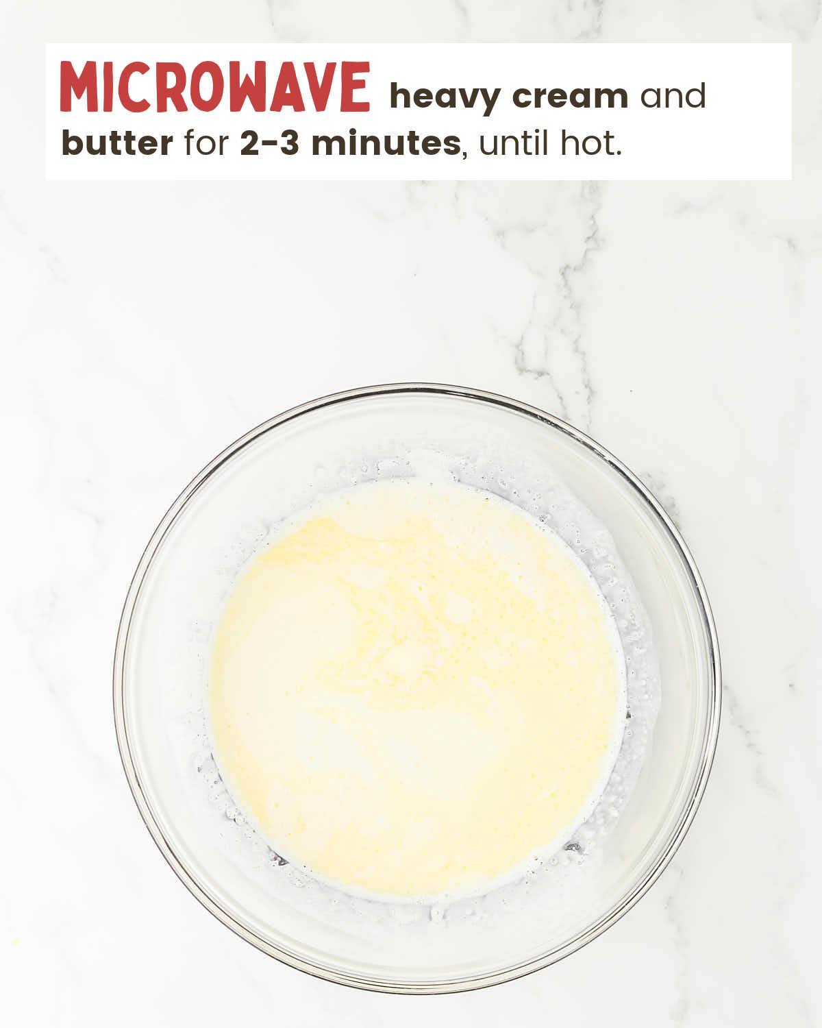Heavy cream and butter mixture in a mixing bowl.