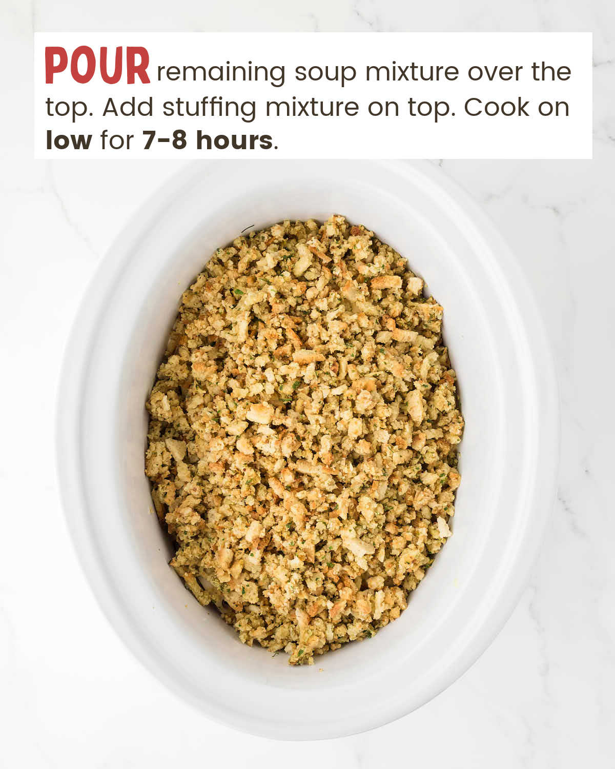 Stuffing mixture on top of chicken cordon blue in a slow cooker.