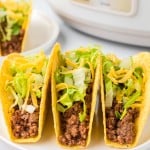 Crockpot Taco Meat in a hard taco shell.