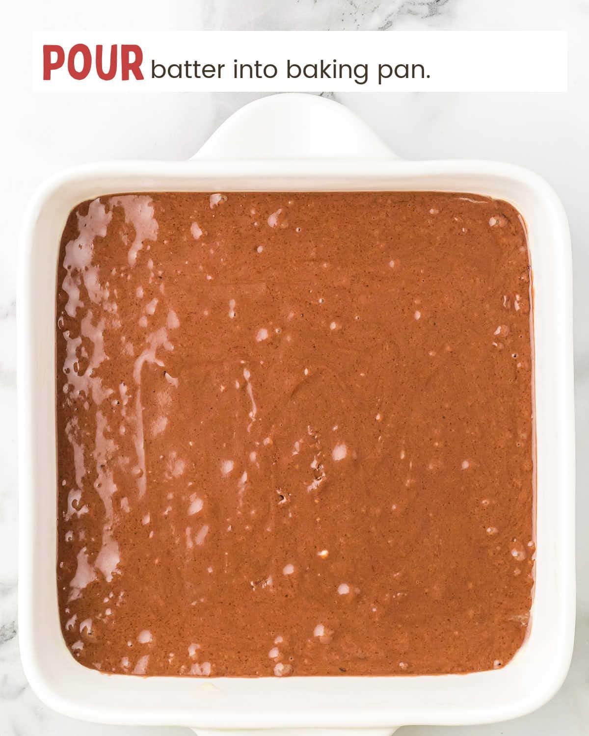 Chocolate cake batter in a baking dish.
