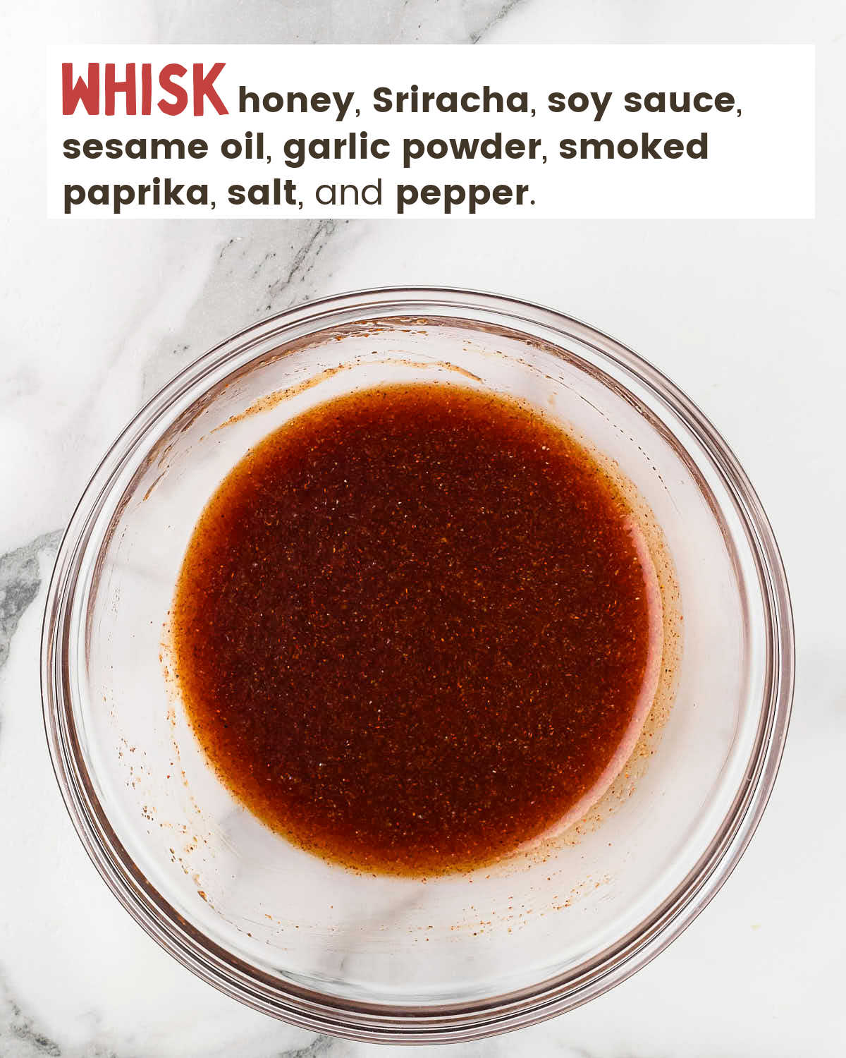 Honey Siracha mixture in a mixing bowl.