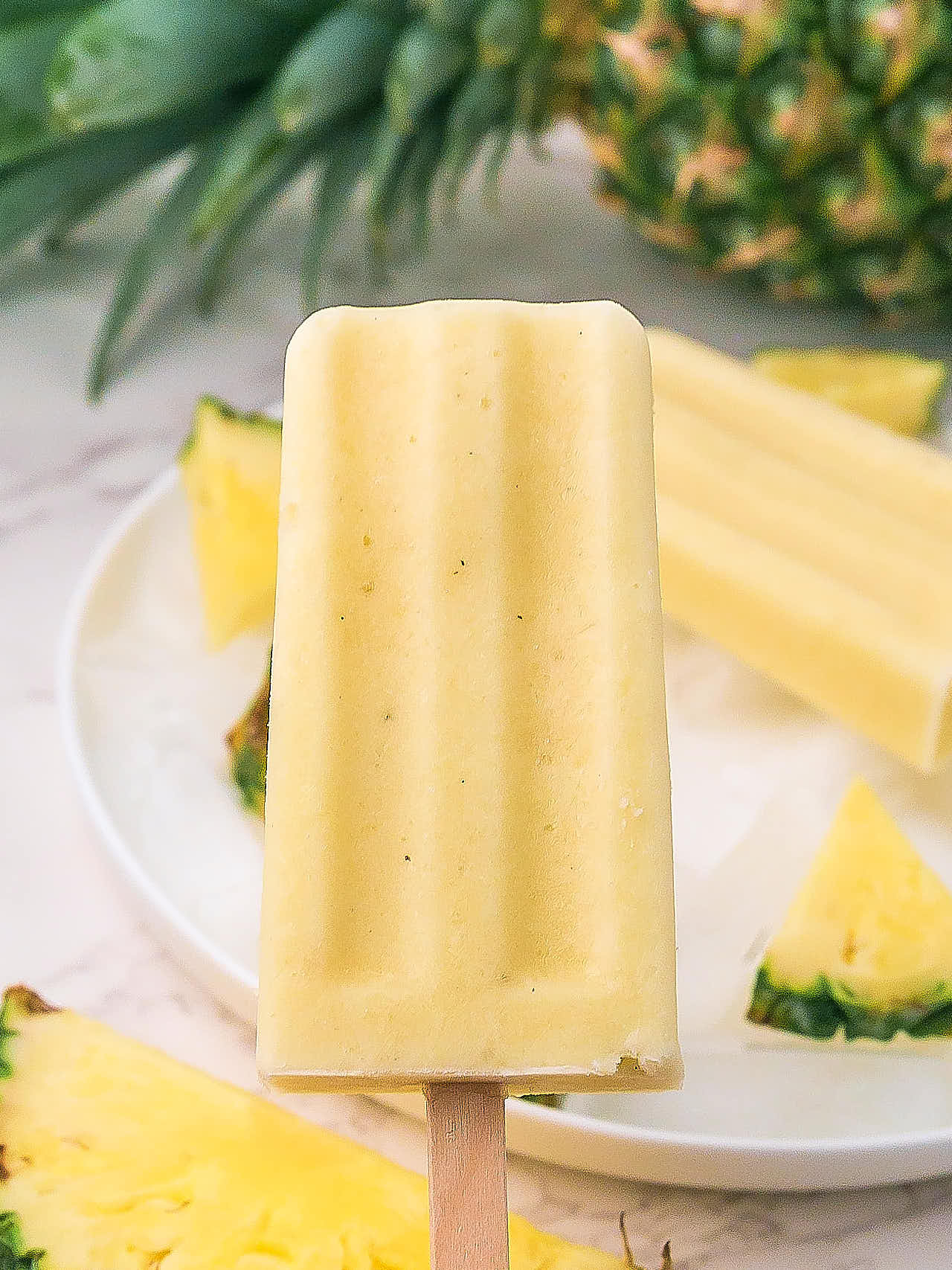 Closeup of a Pineapple Popsicles.