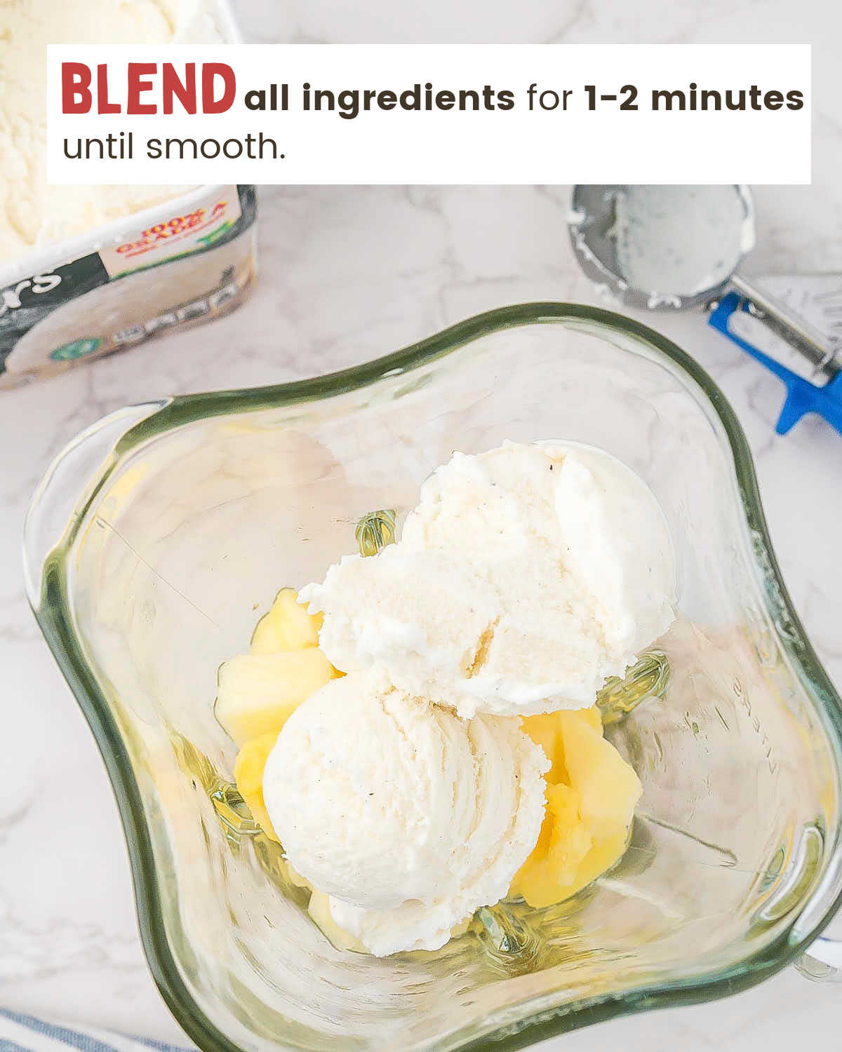 Top view of pineapple, pineapple juice, and ice cream in a blender. 