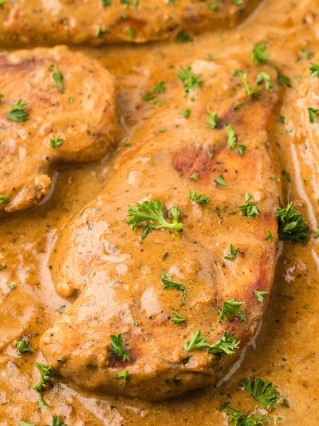 Closeup of Ranch Chicken in a cast iron skillet.