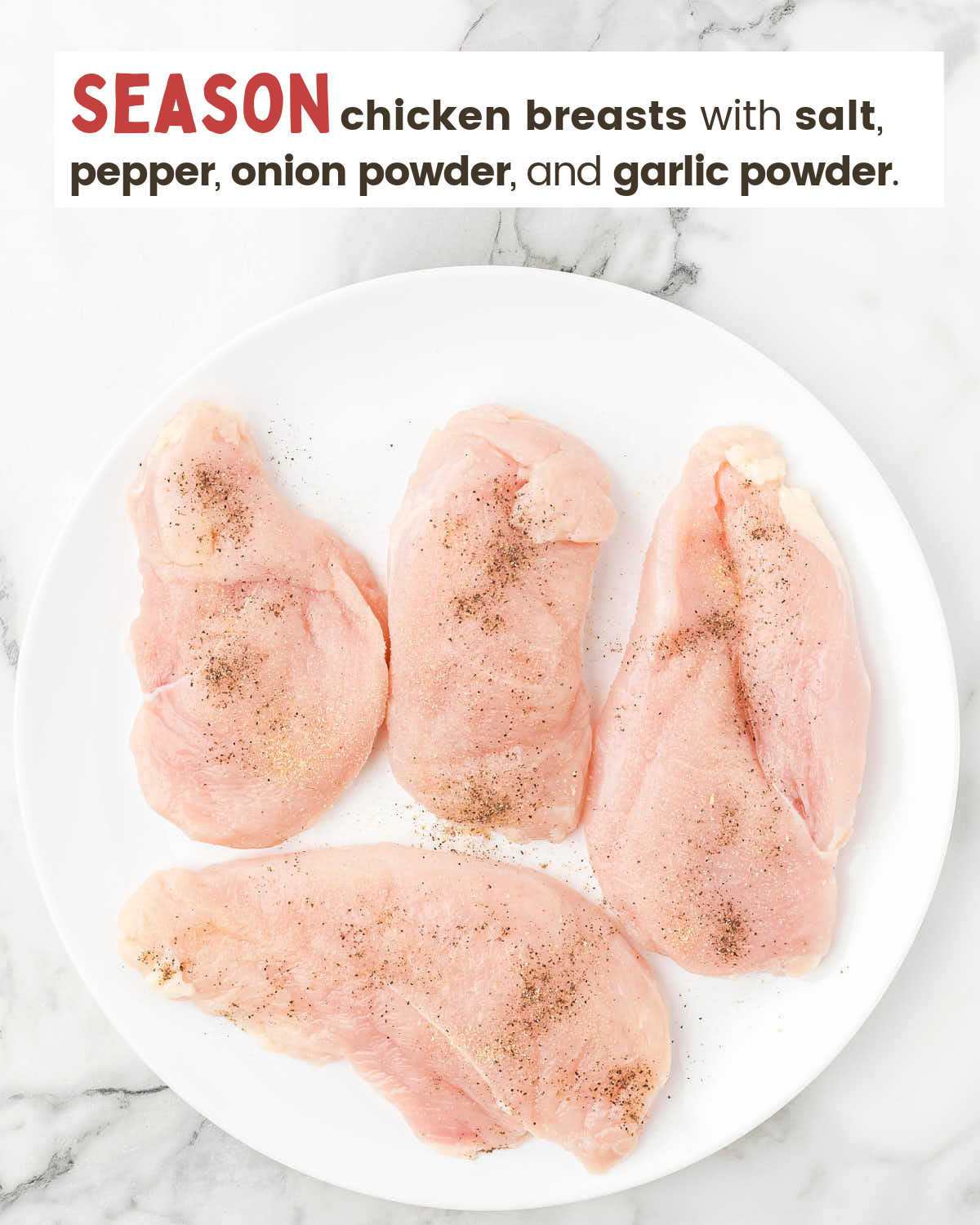 Raw chicken breasts with seasonings on a white plate. 