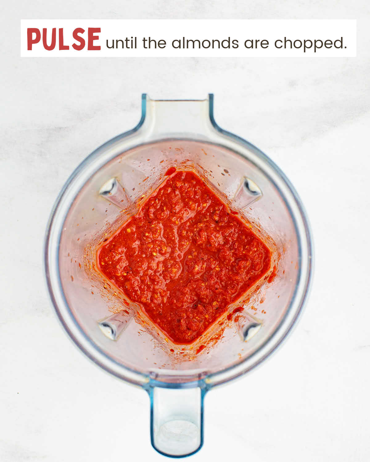 A red sauce in a blender.