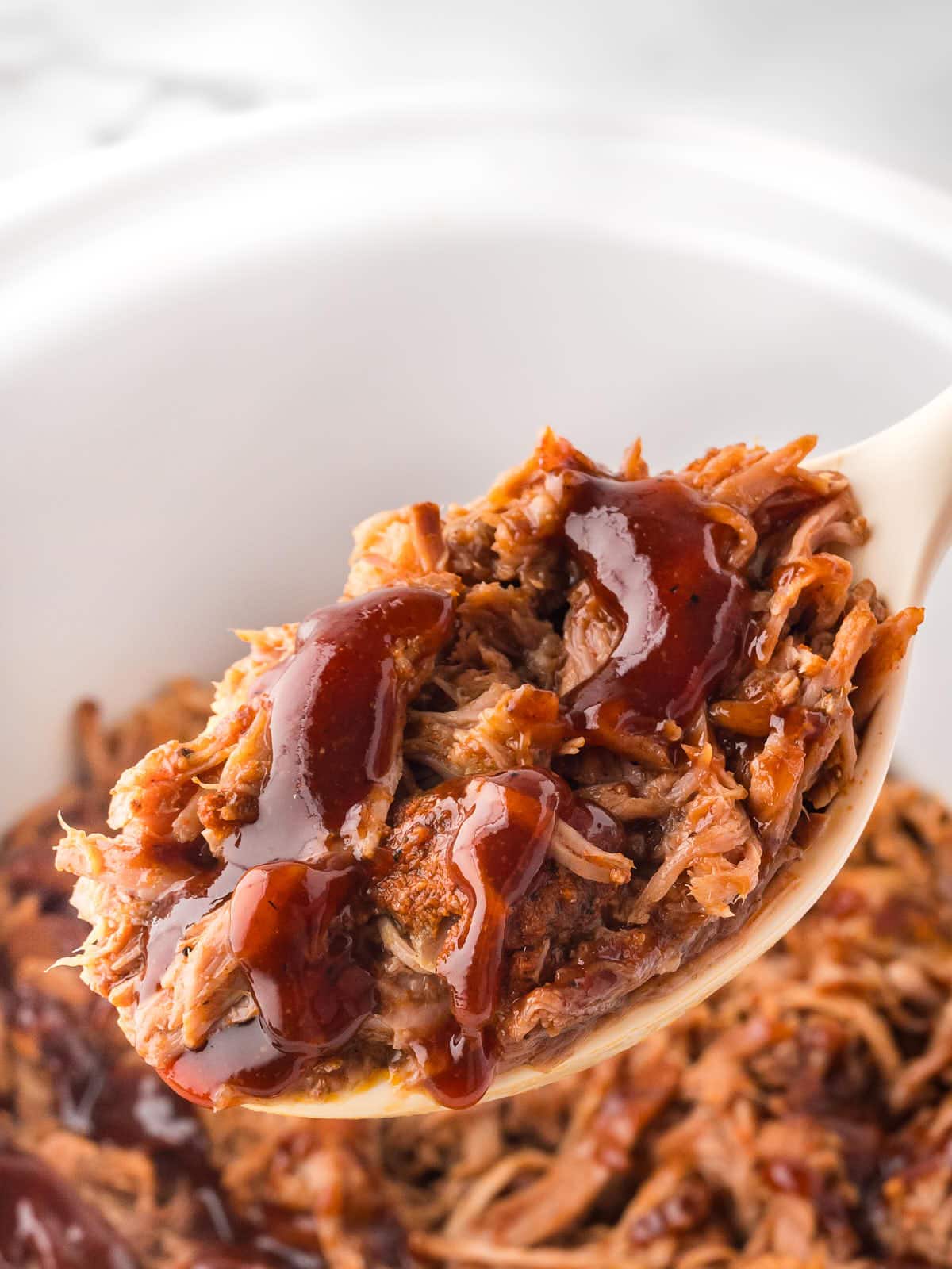 A spoonful of Slow Cooker Pulled Pork.