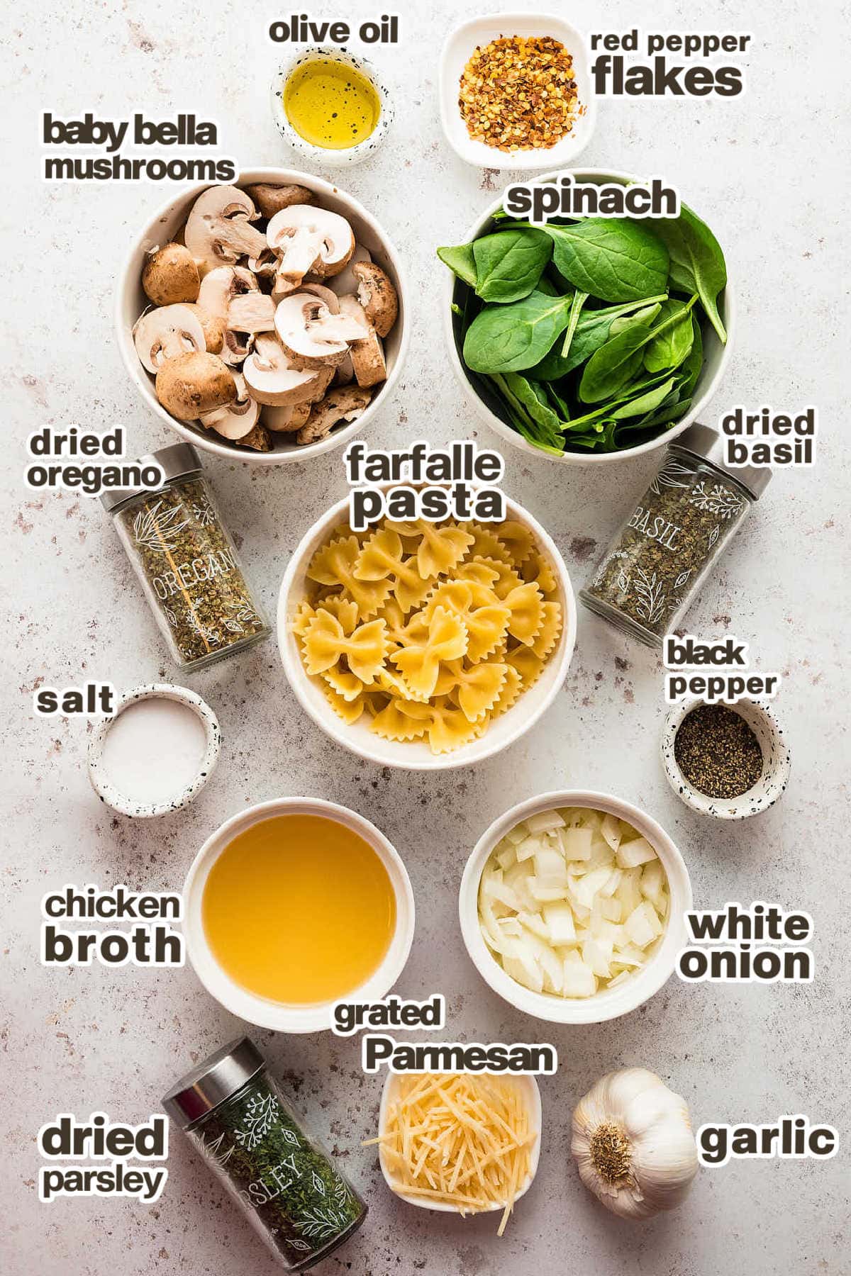 Ingredients needed to make Spinach Mushroom Pasta. 