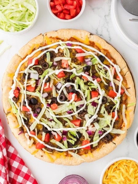 Topdown view of a freshly baked Taco Pizza.
